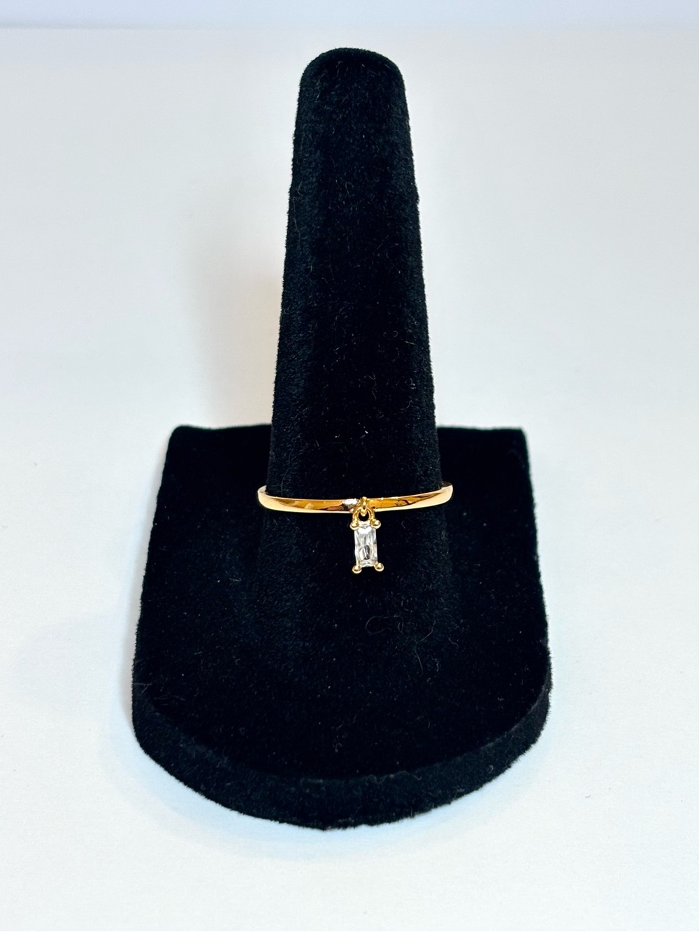Rose gold ring with dangle accent